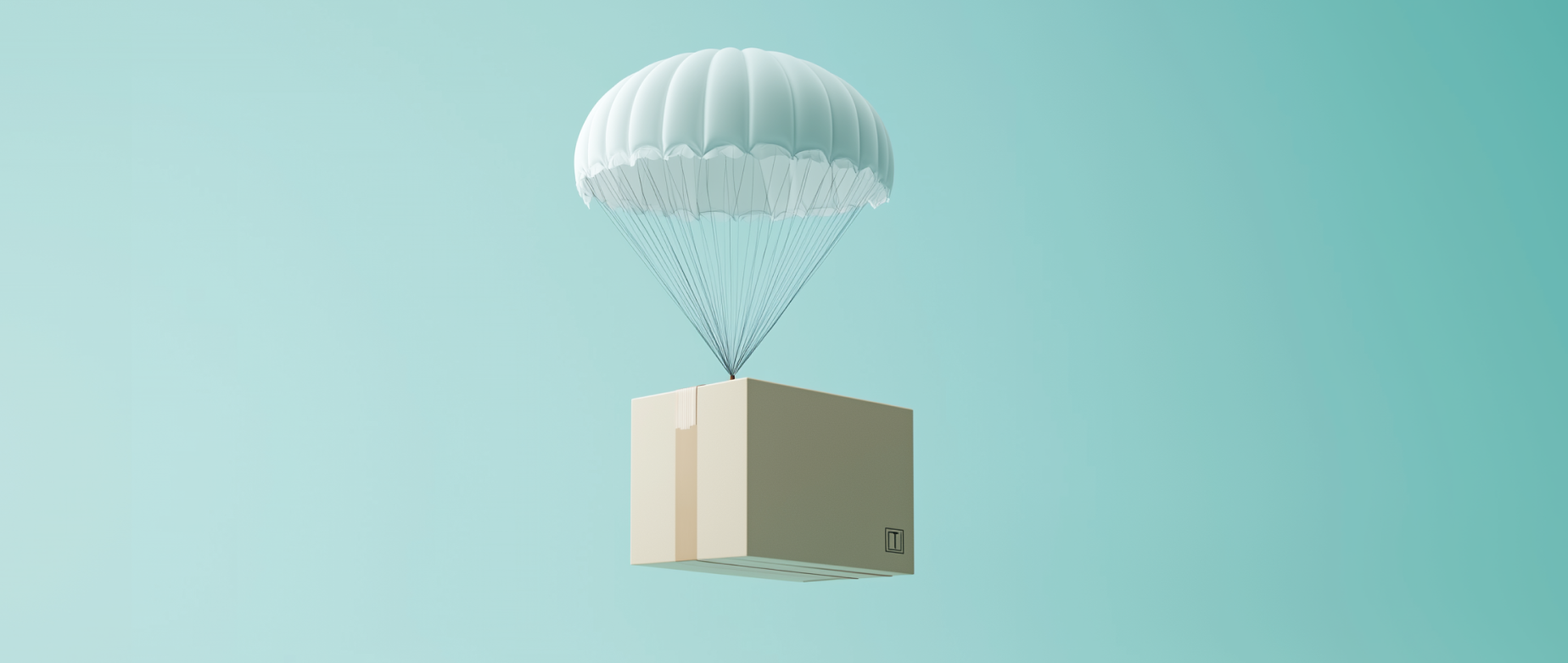 A cardboard package floats to the ground by parachute