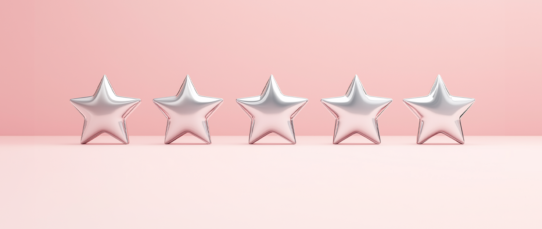 Silver star shaped balloons on a light pink background: customer experience design.