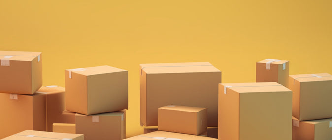 pile of brown packing boxes: how to make money on ebay.