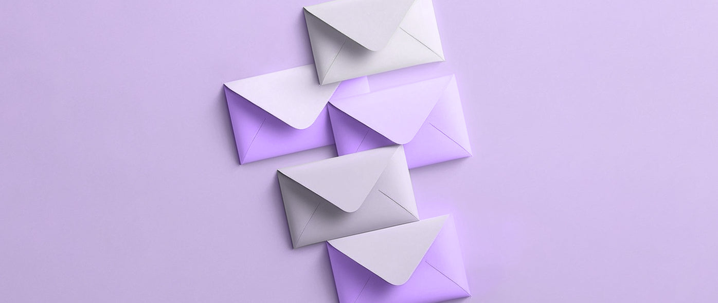 four envelopes that overlap and fall diagonally from left to right: bulk email service