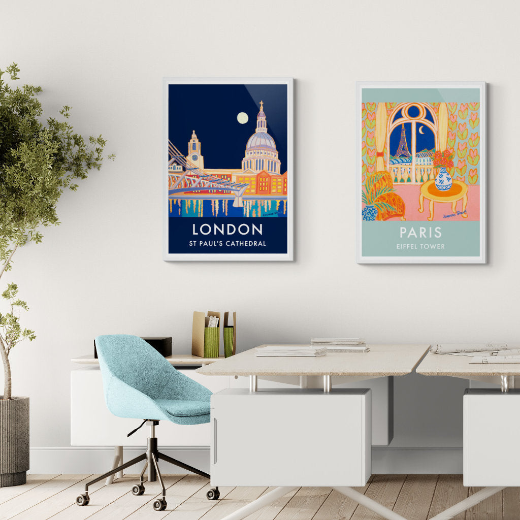 an office space showing art work of cityscapes by Joanne Short
